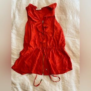 Tomato red zip up silk blouse by Calvin Klein.